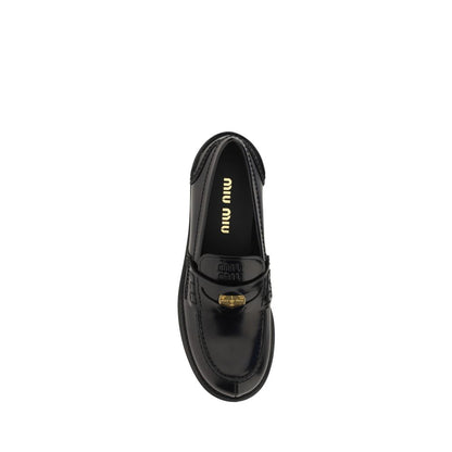 Miu Miu Black Rubber Slip-On Loafers