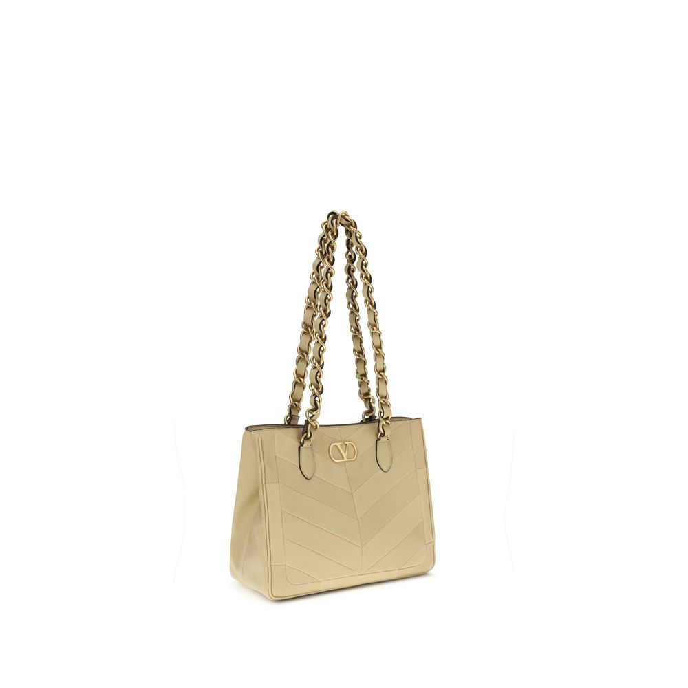 Borsa a tracolla Valentino Garavani Taurus in pelle nappa/vitello color oro